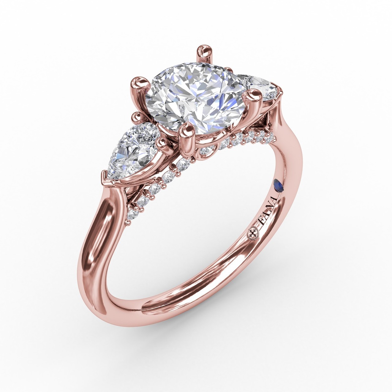 Classic ThreeStone Diamond Engagement Ring With PearShape Side Diamonds